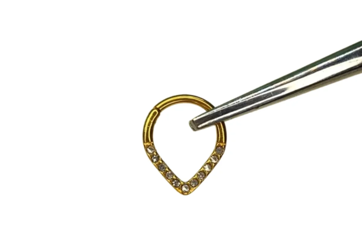 Clicker Gota Dorada — Oasis Piercing